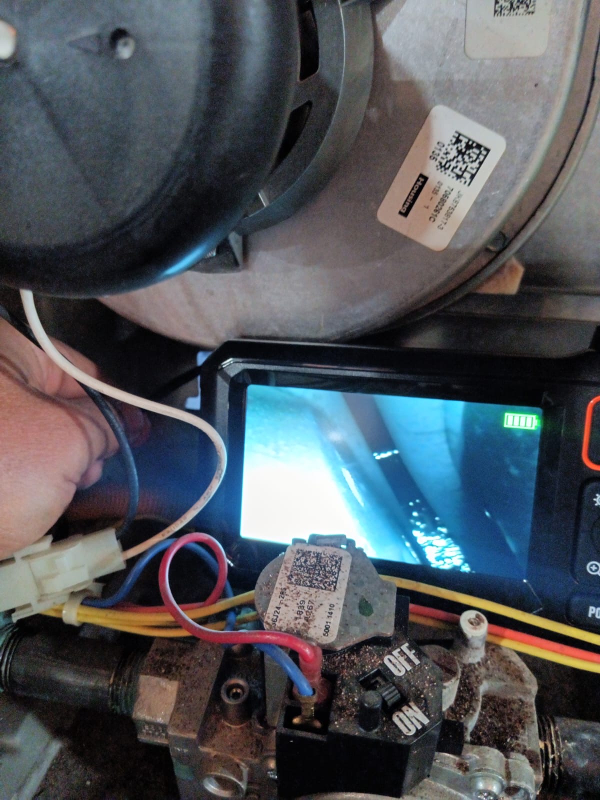 Borescope camera inspection inside HVAC equipment