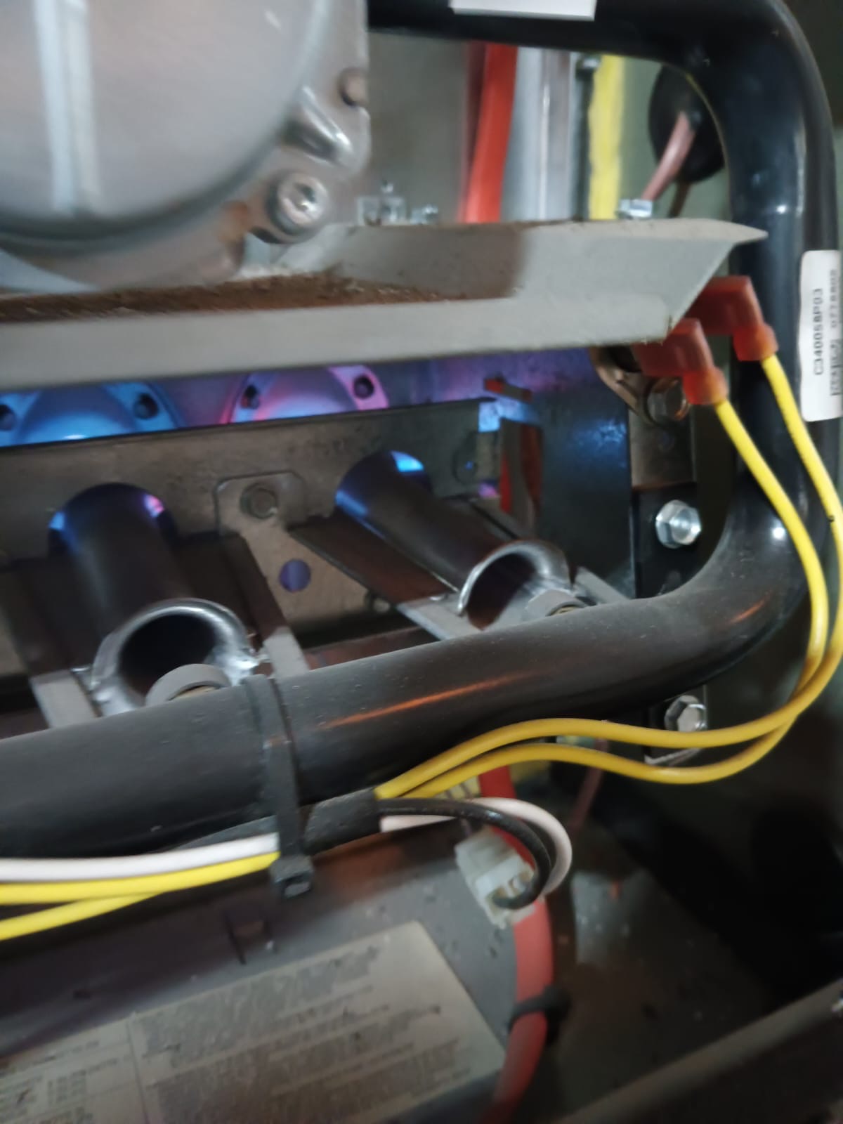 Gas furnace burners firing during heat exchanger inspection