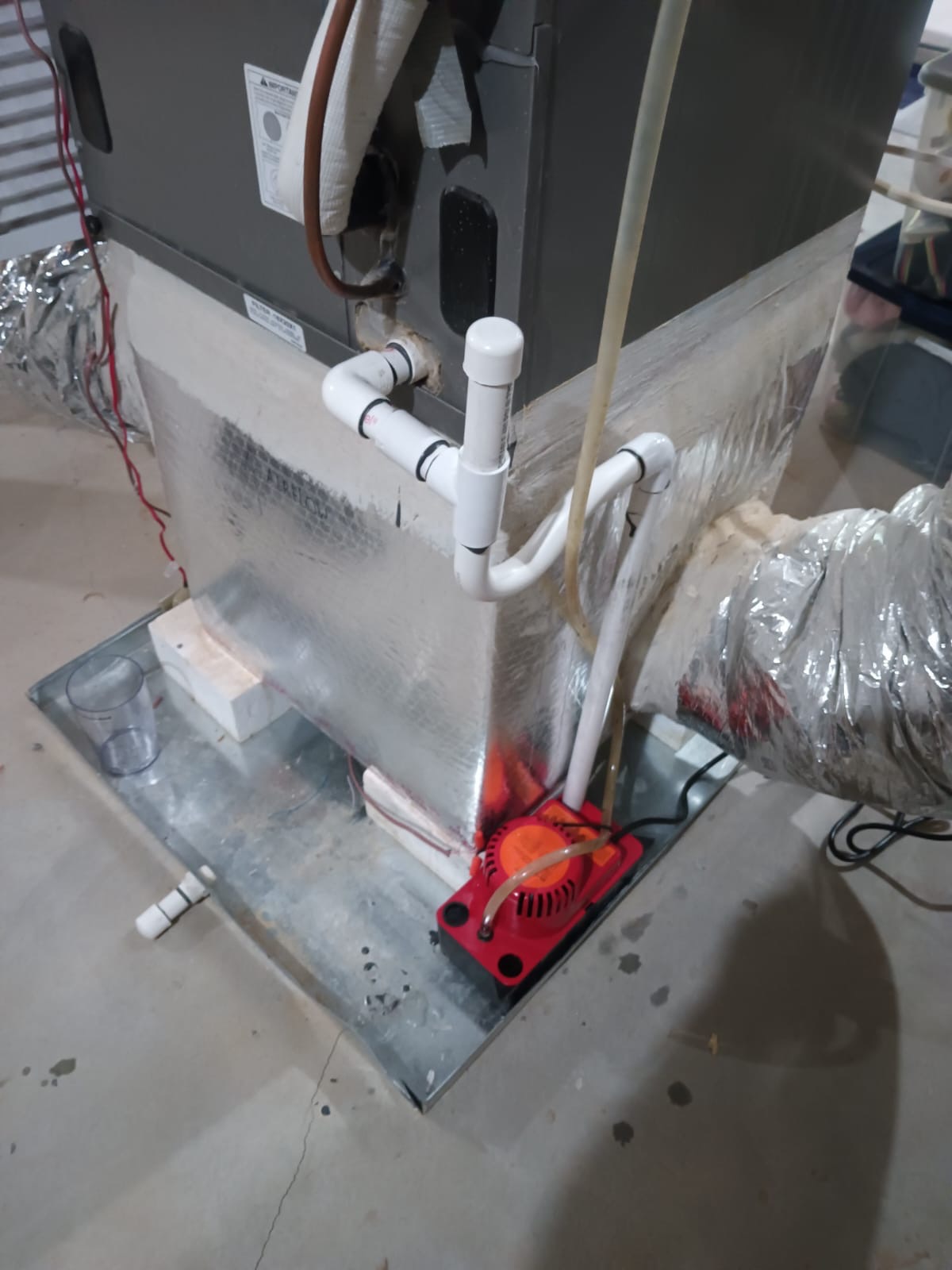 Commercial air handler with condensate pump and PVC drain lines