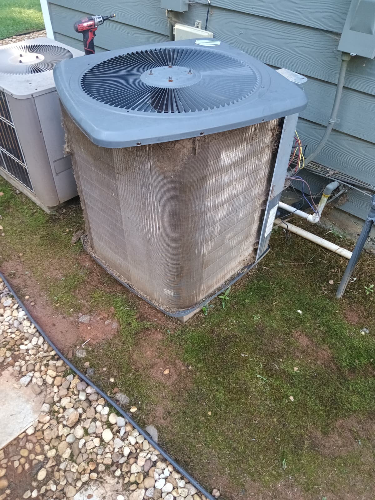 Dirty condenser unit before service